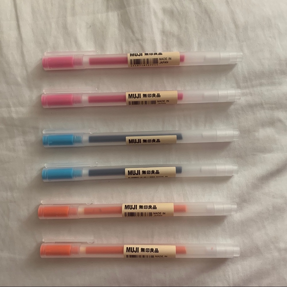 Muji 0.38 light pink, light blue, and orange Pen